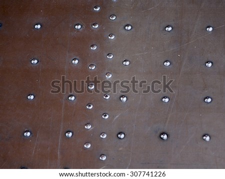 The metal floor of the aircraft used for traps. To reinforce the floor structure used riveting.