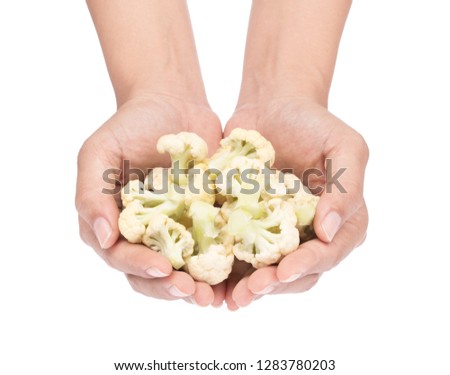 Similar – Image, Stock Photo Hand holding a cauliflower against a neutral background. Healthy food.