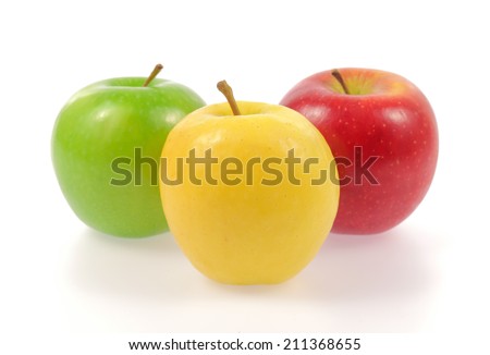 Yellow green and red apples isolated on white background