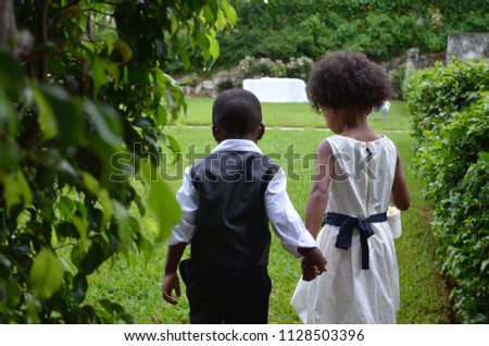 Similar – Foto Bild Ringträger bei Gartenhochzeit spielt mit Blumenstrauß