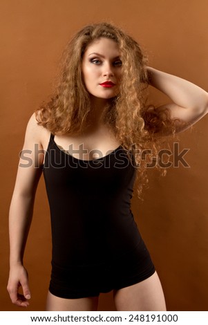 Pretty sporty strong slim and fit young woman. woman engaged in fitness and dance studio