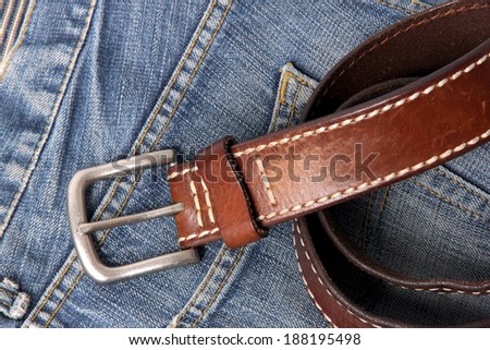 Blue jeans with old brown belt, Horizontal