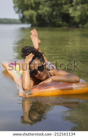 Female relaxing in the water