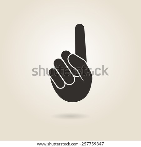 hand gesture with a raised index finger on a light background