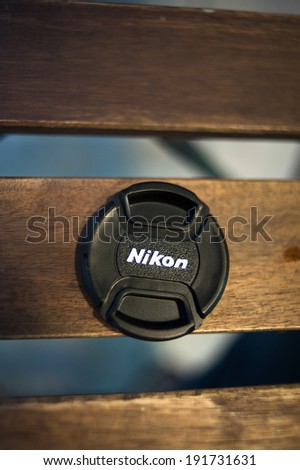 Khonkaen, THAILAND - April 20, 2014: Nikon Lens cover 52 mm. on the table
