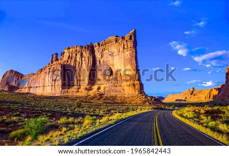 Canyon road in sunny day. Road in canyon. Canyon road landscape. Canyon road panorama