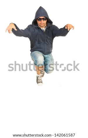 Jumping rapper man with hood and sunglasses isolated on white background
