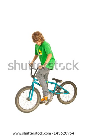 Teenager boy on the bike isolated on white background