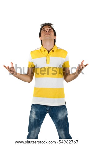 Young man standing with open hands  and looking up ,meditating isolated on white background