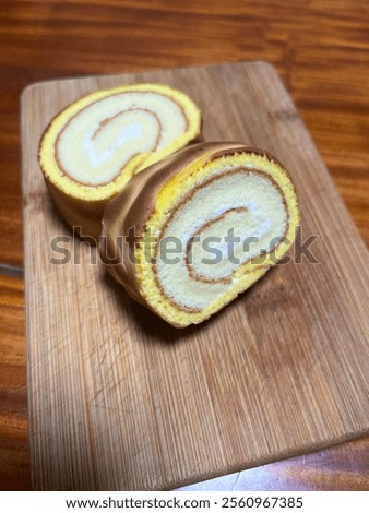 Similar – Image, Stock Photo Baked roll cake with Physalis flowers