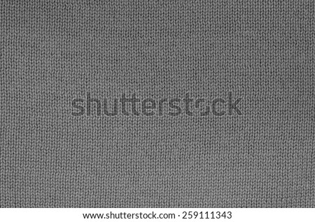 close up of a gray knitted background pattern, knitted right, detail, macro, full frame, blank, empty / Gray knitted Background Pattern, Detail