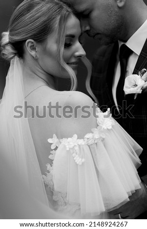 The bride and groom in wedding dresses on natural background. Wedding day. Newlyweds are walking through the forest. . High quality photo Photo stock © 