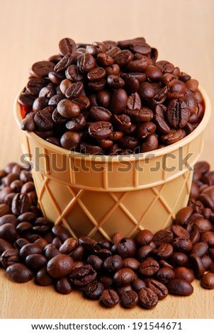 Ice cone mug full with coffee bean