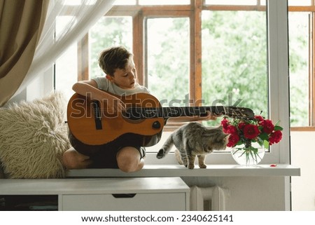 Similar – Image, Stock Photo Child playing guitar