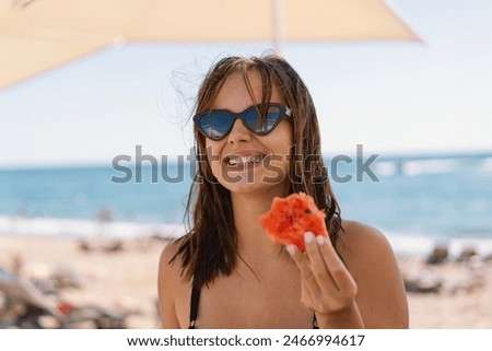 Similar – Image, Stock Photo Woman eating watermelon