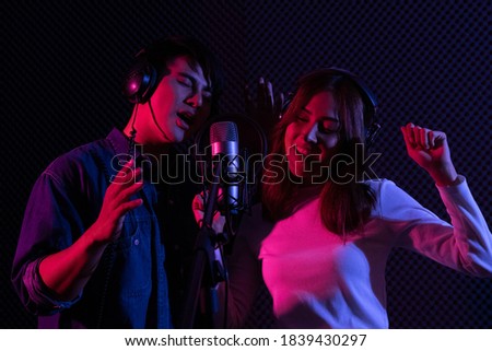 Similar – Image, Stock Photo Couple recording song at home