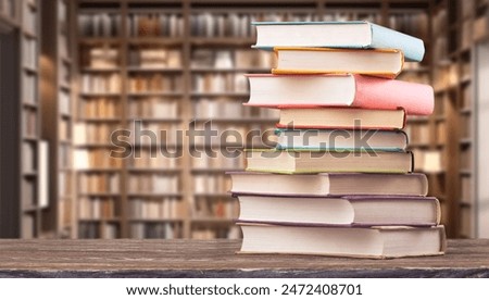 Image, Stock Photo Pile of books and dried flowers on wooden table