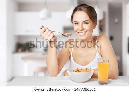 Similar – Image, Stock Photo Young woman eating strawberry dessert in cafe