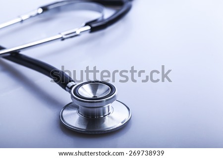 Stethoscope frame, table, medical background.