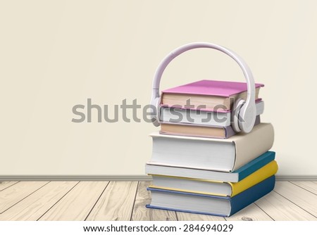 Headphones, Book, Audio Equipment.