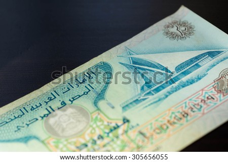 Banknote in twenty dirhams of the United Arab Emirates close up