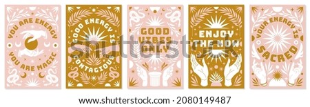 Boho mystical vector posters with inspirational quotes about energy, magic and good vibes. Hand, snake, moon, sun, cosmic and floral elements in trendy bohemian celestial style. Pink and gold colors. 商業照片 © 