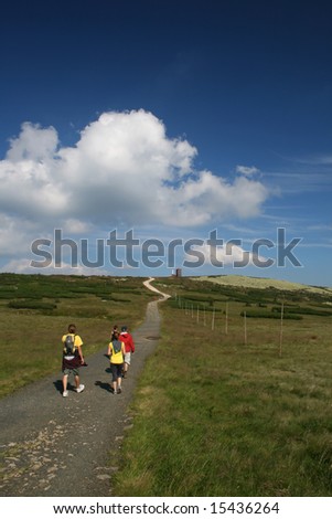 mountain landscape, beautiful summer weather, blue sky, tourists