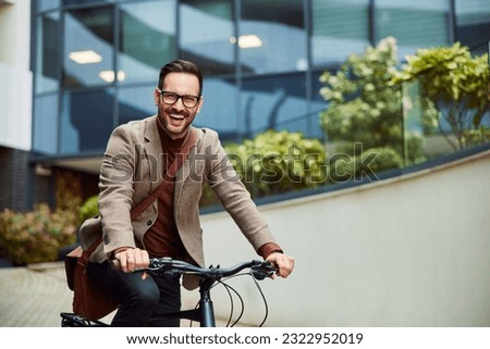 Similar – Image, Stock Photo Cheerful manager with bicycle talking on smartphone