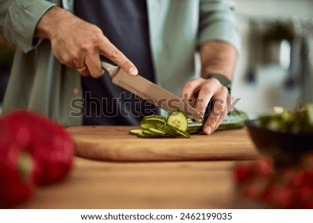 Similar – Image, Stock Photo Close up shot of positive redhead woman with freckled skin and toothy smile, concentrated at display of laptop computer, satisfied with online business, checks received message, has remote job