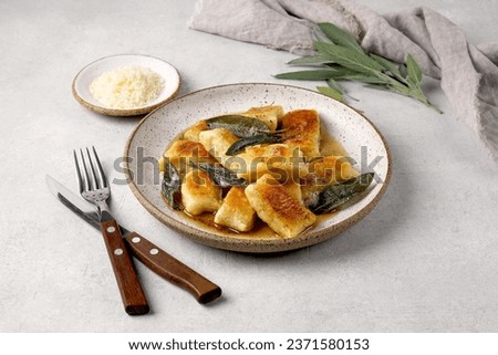 Similar – Image, Stock Photo Homemade gnocchi preparation on rustic kitchen table with ingredients. Top view. Potatoes dough . Italian food concept.