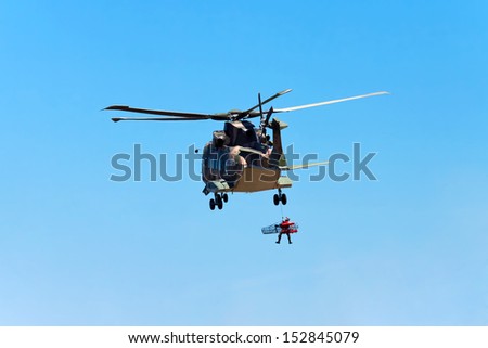 CAPE CABO DA ROCA, PORTUGAL - JULY 30: Military helicopter takes part in rescue operation at Cape Cabo da Roca, Portugal, July 30, 2013