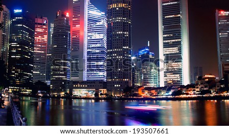 SINGAPORE - JANUARY 22: A business center is located along Singapore River and Gulf of Marina, January 22, 2014.Singapur one of largest financial centers in  world.