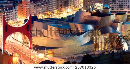 BILBAO, SPAIN - AUGUST 9: Exterior view of the Guggenheim Museum at sunset on Bilbao, Spain. 2013.This Museum is dedicated exhibition of modern art.
