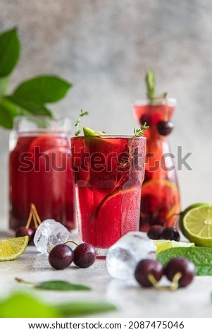 Similar – Image, Stock Photo Homemade refreshing mocktail with soda and orange juice