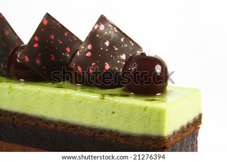 green tea chocolate mousse cake on white