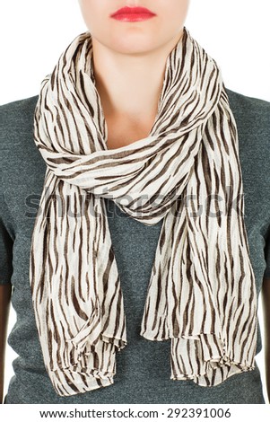 Silk scarf. Beige silk scarf around her neck isolated on white background. Female accessory.