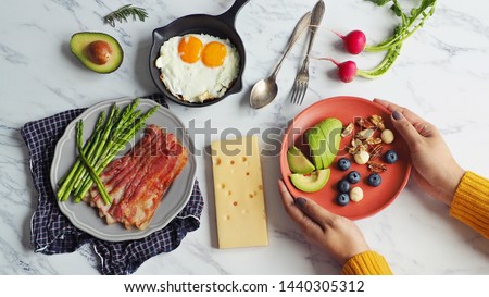 Similar – Image, Stock Photo Female hand with radish in hand in a fruit shop