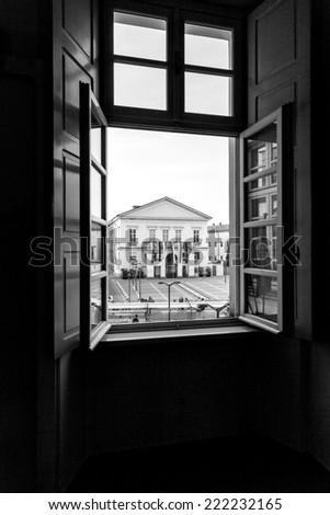 Facade of the theater of Mortara, through an open window. BW image