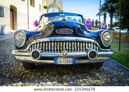 ORTA, ITALY/NOVARA - JULY 18: front view of a Buick Skylark, an old 50s american convertible car, used as a car for the ceremonies. Is parked at the Sacro Monte di Orta. Orta San Giulio, July 18, 2014