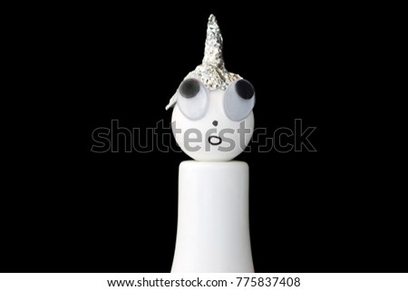 Similar – Image, Stock Photo Funny conspiracy theorist is afraid of Bill Gates and the reptiloids and therefore wears an aluminum hat