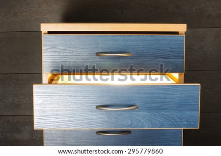 Bright light from furniture drawer