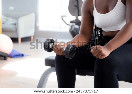 Similar – Image, Stock Photo Woman practicing weightlifting in the gym