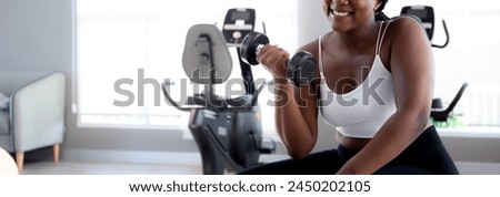 Similar – Image, Stock Photo Woman practicing weightlifting in the gym