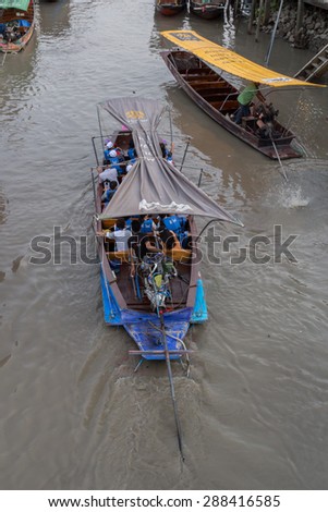 SAMUT SONGKHRAM, THAILAND - May 10:Local merchant sell food ,fruits and product at Thaka floating market,on May 10,2015 in Samutsongkhram,Thai land. Thaka is a popular tourist attraction.