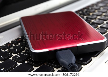 External HDD over notebook keyboard, selective focus