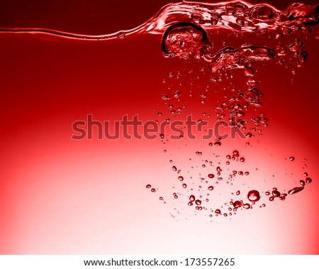 Red juice with air bubbles