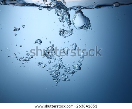 Closeup of blue bubbles underwater