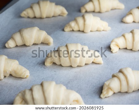 Mini croissant dough in baking tray before bake Foto stock © 