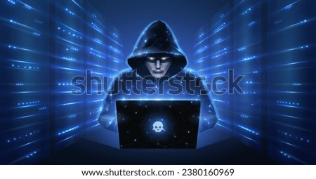 Hacker. Cyber criminal with laptop and server room behind it. Cyber crime, hacker activity, ddos attack, digital system security, fraud money, cyberattack threat, malware virus alert concept