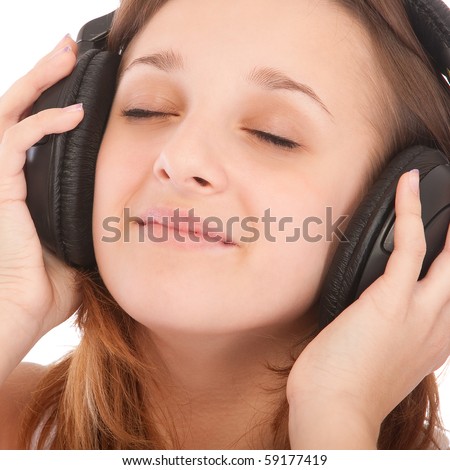 Beauty girl listen music in headphones, isolated on white background.